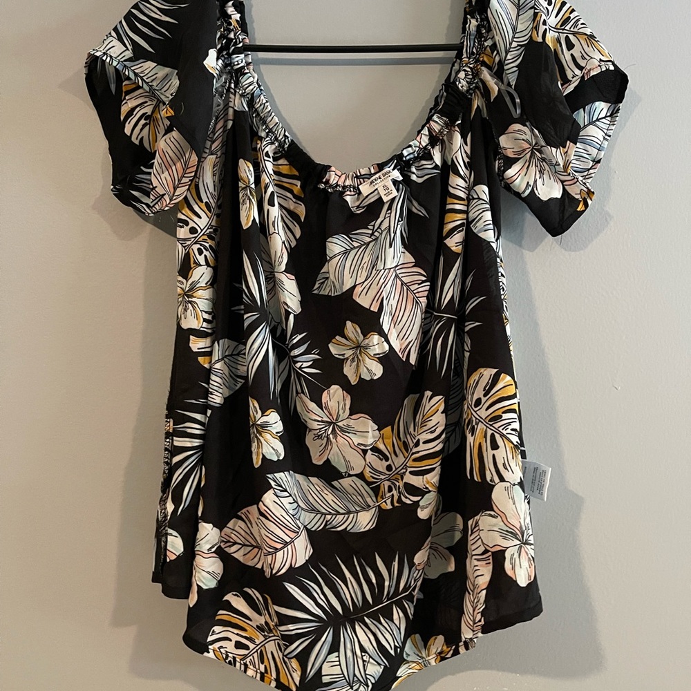 Off the shoulder blouse. Almost crop top length.